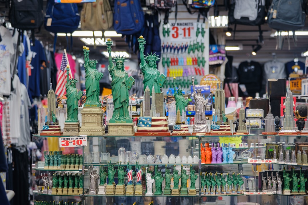 Statue of liberty souvenirs displayed in a store.